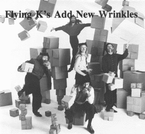 [Karamazov Brothers pose with boxes, photo]